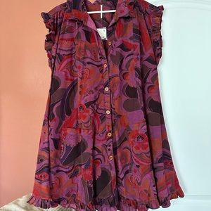 Dress by “Free People”.